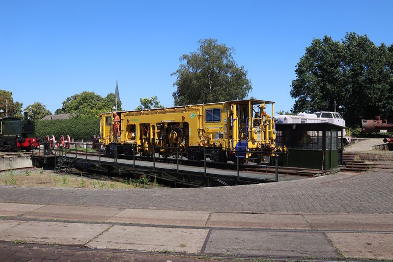 BAM Stopmachine met het fabrieksnummer 1214 en het UIC-nummer 99 84 942 8 702-7.